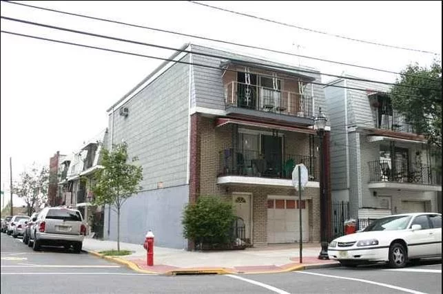 LEGAL 2 FAMILY WITH BONUS APARTMENT. CORNER PROPERTY WITH 1 CAR GARAGE PARKING AND 1 CAR DRIVEWAY PARKING. *PROPERTY CAN POSSIBLY BE CONVERTED TO A LEGAL 3 FAMILY PROPERTY WITH CITY APPROVAL , (PROPERTY HAS A FIRE ESCAPE, 3 GAS METERS, AND 4 ELECTRIC METERS)* Located near public transportation to NYC.