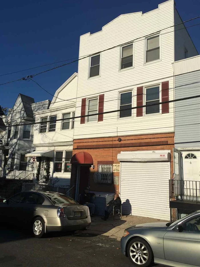 LOCATION LOCATION, IN JERSEY CITY @ BERGEN LAFAYETTE SECTION GREAT BUILDING AT THE CORNER OF WEST SIDE AVE, HAS HUGE INDOOR GARAGE, THAT CAN FIT UP TO 5 CARS. GREAT INVESTMENT PROPERTY. THE BASEMENT CAN BE USED AS A RENTAL GARAGE OR A COMMERCIAL SPACE.