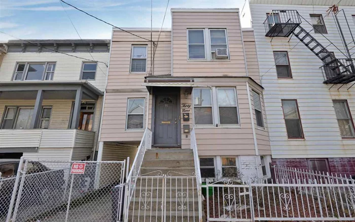 Two family house, each apartment is 2 bed, 1 bath. Low taxes, D/W, renovated kitchens, HW floors.