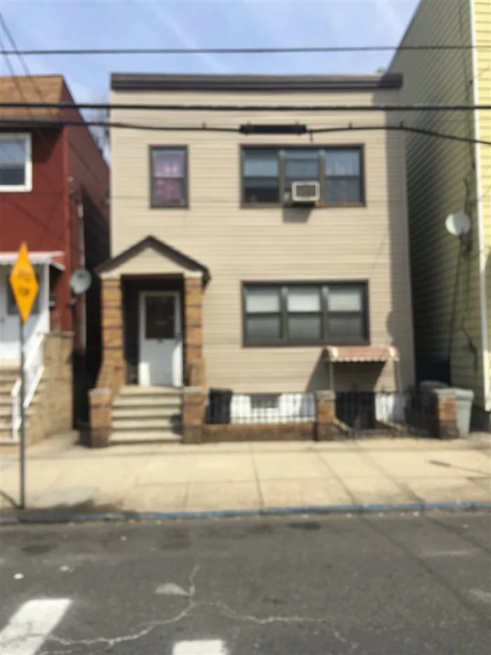 2 family in Jersey City Heights with finished full walk out basement.