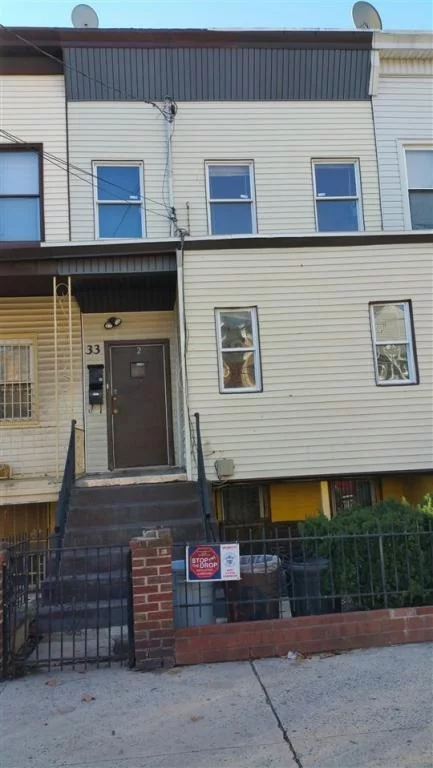Great Opportunity to own, rent or invest in a two family with a duplex, and garden studio. Close to public transportation, park on the corner, & house of worship.