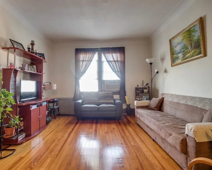 Great investment opportunity for a 2 family located right off of Kennedy Blvd in Union City. 1st floor has original hardwood floors, large living room and access to a backyard. 2nd floor is spacious and bright. Close to all public transportation for NYC commuters, near shops and restaurants.