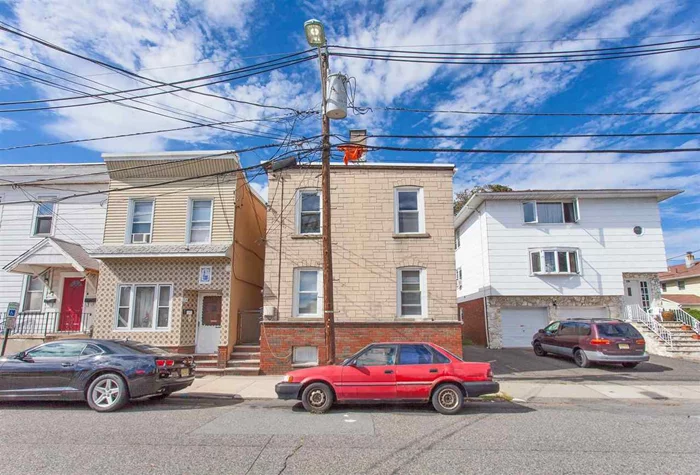 Come check out this great income producing property. Owner occupies 1 unit while collecting rent in another or rent both units. Feature one 2 bed 1 bath and the other is 3 bed and 1 bath. Also has finished basement. Do not miss out on this investment opportunity.