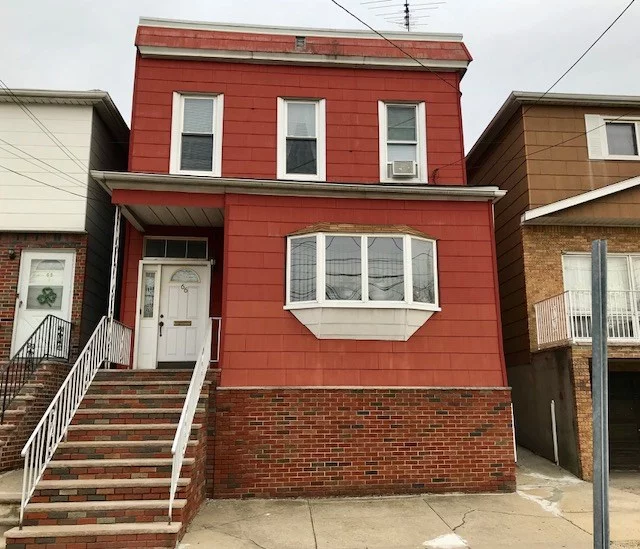 Newly updated 2 family home. First floor apt. has 3 spacious rooms with tiled bath & hardwood floors throughout. Second floor apt. has 5 rooms with tiled bath. basement is finished with full bath. Great JC Heights Western Slope location. Just 1 block to bus transportation to NYC & Journal Square PATH. This is a must see!