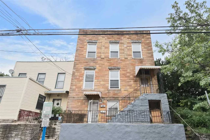 On a quiet street in the western slop of the Heights sits this solid brick 2 family home on a 25 x 100 .This property is perfect for someone looking to put some TLC into home so they can live there and rent out the other unit. Or for a builder/investor to build out and sell as condos or a 2 family. This property is currently vacant and being sold AS IS. Current Configuration: Unit 1 is a duplex, enter through ground level into living room, kitchen, with bathroom, and also has an office/den area with easy access to the backyard Right up the steps are 3 bedrooms and 1 full bathroom. Unit 2 is 1 floor also consisting of 3 bedrooms, 1 bathroom, eat in kitchen and living room. Taxes $5995