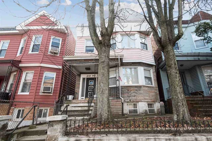 Good size 2 family home, well maintained featuring 2 bedroom apartments with tiled baths,  semi-finished basement and deck. Needs some upgrading but priced to sell. Excellent Heights location, convenient to Central Ave shopping and NYC transportation. Call today!