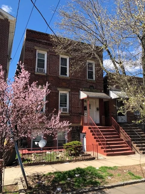 Solid brick 2 family house with 4 floors on a quiet tree line street in the Western Slope section of Jersey City Heights. Featuring a 1 bedroom, 2 full baths, living room, family room, 1 kitchen plus a summer kitchen duplex with a large deck. The 2nd unit features 2 bedrooms, living, eat in kitchen and a full bathroom. Located just 3 blocks from JFK blvd with buses to NYC in less then 30 mins or Journal Path Station in 10 mins. Also conveniently close to Tonnelle Ave with easy access to all major highways.