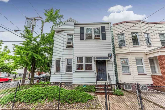 WELL MAINTAINED 2 FAMILY HOME FEATURING 4 AND 5 ROOM APTS, CORNER PROPERTY WITH DESIRABLE 2 CAR GARAGE. LOCATED JUST MINUTES TO JOURNAL SQUARE PATH, NYC BUS TRANS AND MAJOR HIGHWAYS.
