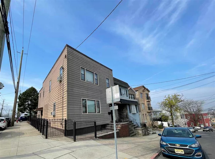 2 Family home on oversized corner lot 25.5 X 121 with 4 garages in Prime Heights location. Needs total re-hab Ideal for builder. Property SOLD strictly As Is with contents.