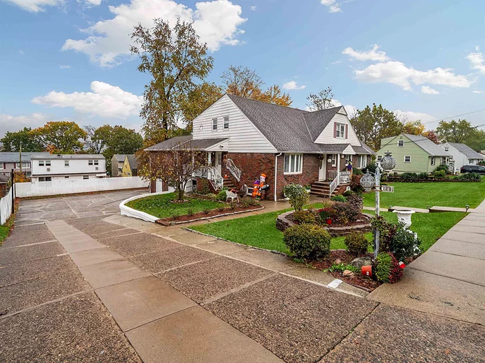 Welcome to this meticulously maintained 2 family home in the heart of Totowa! This uniquely built house offers great income producing potential to the homeowner, since this property has it all. It sits on a huge lot size (133X100) boasting covered parking for 2 cars plus a driveway that can fit up to 6 more cars. Unit 1 features 4 great sized bedrooms and 2 full bathrooms, a large living room area, a dining room, a modern kitchen with stainless steel appliances such as: stove, double refrigerator, and microwave. This unit has central A/C and baseboard heating throughout, marble and hardwood floors and washer & dryer in the unit. (currently being rented). Unit 1 has a nice private wooden deck. Unit 2 features 2 great sized bedrooms and 1 full bathroom. This unit has a generous living room, dining room area, a full sized modern kitchen with stainless steel appliances such as: double refrigerator, stove, dishwasher and custom cabinets. There are hardwood and marble flooring throughout, washer and dryer and central air as well. The full finished basement unit features a great open living room/dining room open concept area, a summer kitchen, and a full bath. This is the property that keeps on giving!! There is an extensive backyard and covered patio area for everyone's enjoyment and entertainment. The lawn has an underground sprinkler system, and there is a storage shed. Utilities for all units are completely separate, even water.