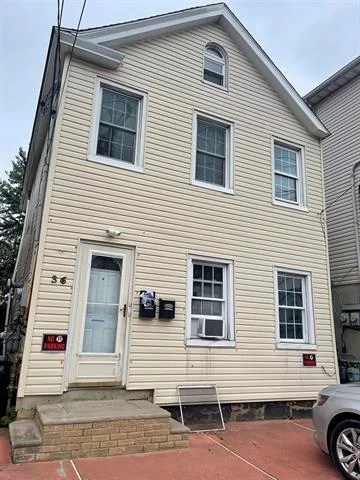 Beautiful 2-family home! 1st floor 2BR/1BA recently renovated with large kitchen and good sized rooms. 2nd floor 1BR/1BA with finished attic and half bath above. 2 parking spots and huge yard. Will be delivered vacant.