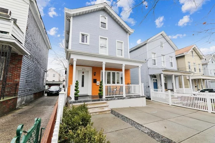 Welcome to this immaculate turn-in key two family house in the heart of Jersey City! This home is in mint condition. There are two DUPLEX's units. Unit # 1 is a 4 bedroom 3 full bathroom, comprising two floors of living space. Unit #2 is a 3 bedroom 1 bathroom. Both units have beautiful formal dining room spaces and spacious living rooms.Some of the features in the house are as follows: Hardwood floors throughout plus tiling in kitchens and bathrooms, baseboard heat, ceiling fans, wall A/C units, recessed lighting, a fenced paved backyard and parking for 3 cars. Both kitchens are modern , with custom cabinets, stainless steel appliances such as; double refrigerators, built-in m/w, full dishwasher, granite counters and tiled backsplash. The house is detached and it is close to all transportation to the city, shops, restaurants, schools and highways. Great income potential from both rental units.