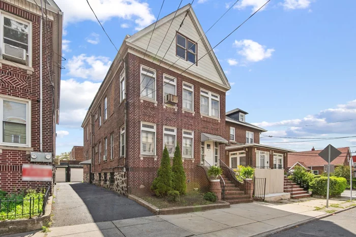 This special two-family brick home has been lovingly owned by one family since it was built in 1927. It is nestled in on a quiet dead-end street on a huge 30 X 100 lot with a shared driveway and two car garage. You can see the care that was taken in its upkeep from the stained glass windows to the pristine hardwood parquet floors to the brass and glass doorknobs throughout. The first floor unit has 2 beds/1 bath and second floor unit has 3 beds/1 bath which could be made into a duplex with the attic. Separate utilities. Every room in the house is open, airy and bright, with large windows. The formal dining room and living room are perfect for entertaining or having family over for Sunday dinner. Less than a block from the bus to NYC and a stones throw away from Audobon park.