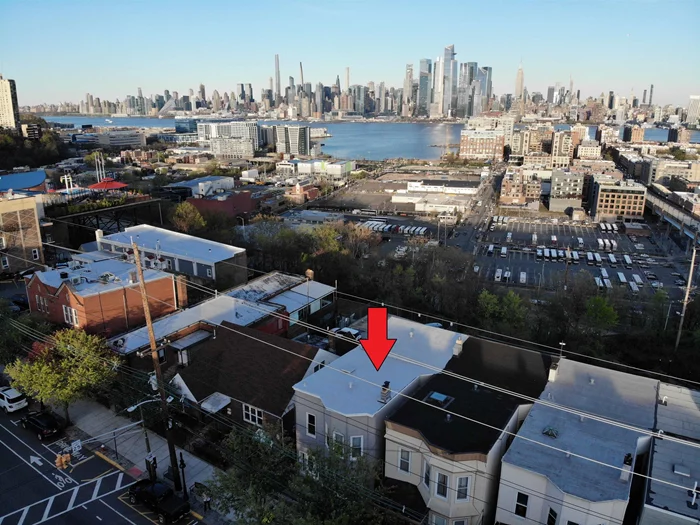 This is your chance to own a premier townhome in the most desirable gold coast location. Perched up on the east side of the palisade avenue cliff, this 25' wide two family home features jaw dropping views of NYC skyline. Spread out and enjoy the owners' units massive duplex floor plan. Unit 1 features two floor living totaling 4 BR & 2 Full Baths. Parlor level offers quality living space, large chefs' kitchen and sun filled dining room to soak in breathtaking sunrise & sunsets each and every day. Walk out your sliding doors to your private well-manicured backyard. A true urban oasis that cannot be matched.  Spacious guest room, King sized master bedroom & Spa like marble bathroom completes the first floor. Other features include soaring 10' ceilings, pristine original hardwood floors throughout, and Old world charm. Large, finished walk out basement offers additional living space + two additional BRs, laundry room, & full bath. Second floor unit offers even more square footage with oversized 3 BR 2 Full baths unit. Fantastic rental unit with incredible income potential. The opportunities are endless. Location is a commuters dream with a bus stop at your doorstep with only a 16-minute bus ride to Port Authority. Short distance to all other neighborhood shops, eateries & amenities, Washington Park, Community Pool, Light rail station, Hoboken & Weehawken waterfront. Homes of this caliber rarely come to market and will not last long. Don't miss out on your chance to own such a prized piece of real estate.