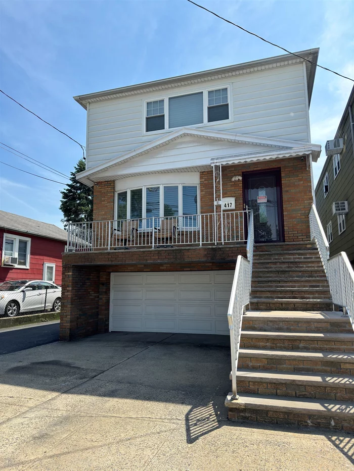 Fantastic investment opportunity with this beautifully renovated multi-family house located on a quiet street in Jersey City. This property is perfect for savvy investors looking to live in one unit while renting out the others. Boasting ample parking, a rare find in the neighborhood, this home is just minutes away from NYC, offering the ideal balance of suburban peace and urban convenience. Well-built 2 family on an oversized lot (35x95). This home boasts a finished ground floor, parking for over 8 cars and has been completely renovated in 2021. Featuring modern upgrades including new floors, doors, windows, recessed lighting, and stylishly updated bathrooms Both units offer 5 solid maple flooring as well as a high-end stainless-steel Samsung appliance package and new solid wood cabinetry topped with quartz countertops. Top floor 2 bed, 1 bath home offers large covered deck. The main level features 3 beds, 1.5 bath with interior stairs to the bottom level. Ground level, behind 2 car garage, is an open floor layout with full bath and kitchenette with 2 entrances, one from the side and one from the back. Whether you're seeking a primary residence with income potential or a profitable addition to your portfolio, this move-in-ready gem is not to be missed. Seize this chance to secure a lucrative asset!