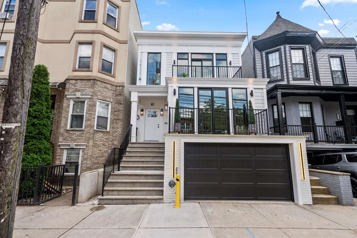 Welcome to this Weehawken stunner! A two family home taken down to the studs and meticulously rebuilt to impress even the most discerning buyer. Commute to the city? An easy 2 minute walk gets you to the NJ Transit bus that will have you at Port Authority in just minutes. Prefer to drive? Never worry about parking or getting caught in the rain again with a full size attached garage. Unit one is a 4 bed(2 legal den) and 3 full bath duplex featuring a private entrance, full size garage and an oversized beautifully landscaped backyard. Unit two is a 2 bed and 2 bath unit featuring 10ft ceilings, a private entrance and a private balcony. Here are just a few of the highlights of the property: - Custom Pella windows - custom kitchen cabinets - Solid white oak flooring with a 1/4 rubber underlay - double sheetrock in between units - 8' tall solid core wood interior doors - 8' ceilings in the basement level - west elm vanities - in unit laundry for each unit - pre wiring for security cameras, and more!  This versatile property is well suited for an owner occupant, investor or even as a single family if desired.