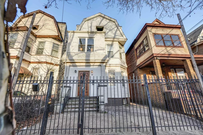 Legal 2 Family converted to single family. 4 beds 2.5 baths. 3, 000 sq/ft. Renovated kitchens. Renovated bathrooms. Laundry in unit. Walking distance to light rail and bus. Proximity to Liberty State Park, Science Center, and restaurants. Spacious backyard with Grape, Hackberry, and Mulberry trees.