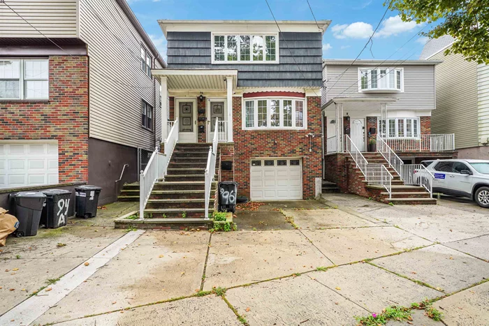 Back on Market - Pride of ownership can be seen throughout this oversized 30 x 112 lot 2 family home in desirable uptown Bayonne right off Ave B and just a few blocks from the Light Rail, Hudson County Park, and Washington Grammar School. Property is a legal 2 family with an in-law Suite on the ground floor adding to the desirability and appeal. Inside features 3 beds and 1.5 baths per the top 2 floors with hardwood flooring, upgraded windows, very good condition kitchen and baths. Utilities are separate and house features central AC. The yard is large and has a full wrap-around vinyl fence and in the front is garage parking and automatic light. This one really has it all, to live in or invest in the future. The property will be delivered vacant with wired security cameras and ready for its new owner. Call now for more information or to schedule a showing