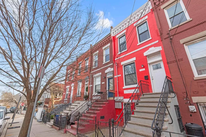 Turn-key and ready for you to move right in. This Brick 2-family row-home offers an owners duplex with a fantastic 1 bed rental unit on the garden level perfect for generating income, and short term rentals! Enjoy the lovely tree lined street filled with early 1900's brownstone/ row-house style homes. Have lots of fun in the nearby Berry Lane Park equipped with tennis & basketball courts, a splash park, and a skate park! Explore the growing food scene in Bergen Lafayette and all of the community events. Easy commute to NYC, Light-Rail and NJ transit bus within minutes of your front door.