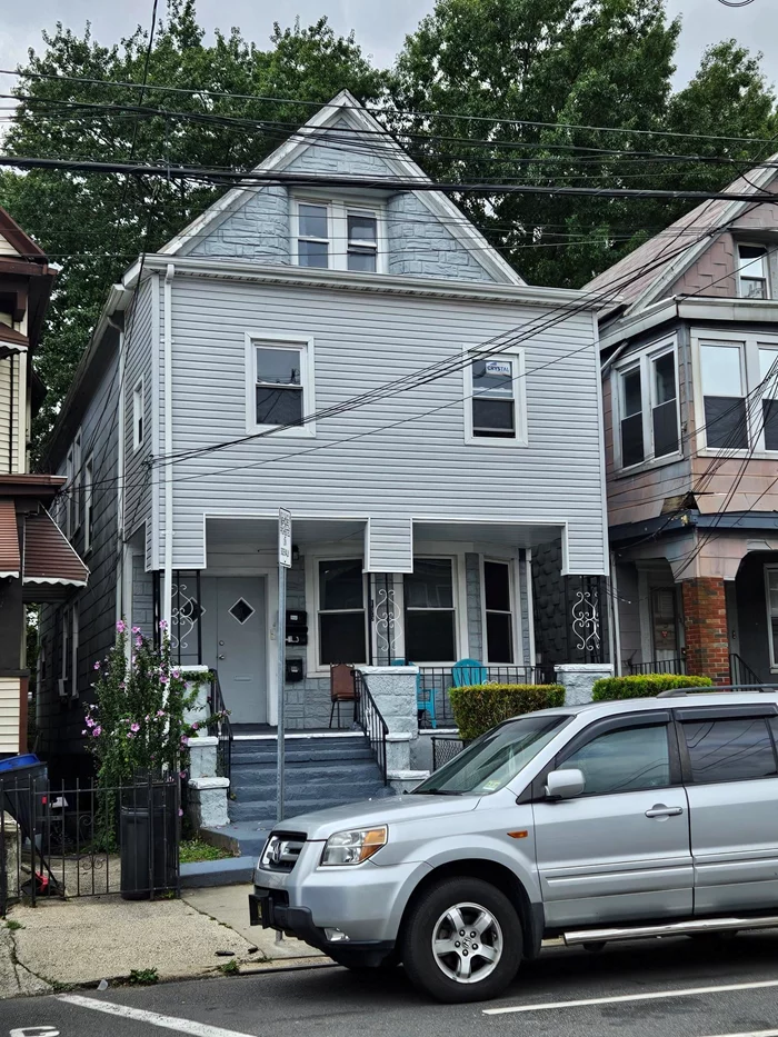 UP & COMING AREA IN JERSEY CITY 2 UNIT HOUSE WITH PARTIAL FINISHED BASEMENT AND ATTIC SOLD AS IS WALKING DISTANCE TO LIGHTRAIL NEAR 14B NJ TURNIPKE, LIBERTY PARK, BAYSIDE PARK BASEMENT & ATTIC ON HOUSE ELECTRIC METER WITH SEPERATE HIOT WATER TANK NEW WATER HEATER 5 MONTHS OLD RADIATOR HEAT