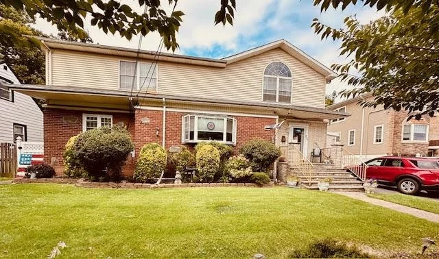 Beautiful 2 family home right in the heart of Secaucus. Large kitchen, living room, dining room, full bath and bedroom ( or Den ) on main floor. Walkout to a beautiful deck and yard. 2nd. floor features 3 large bedrooms, bathroom and master suite with private balcony. Lower level has bonus studio for extended family and 1 bedroom apartment. 75 x 100 lot. 7 Bedrooms and 5 Full baths.           Close to public transportation, shopping, schools, parks, houses of worship and more.