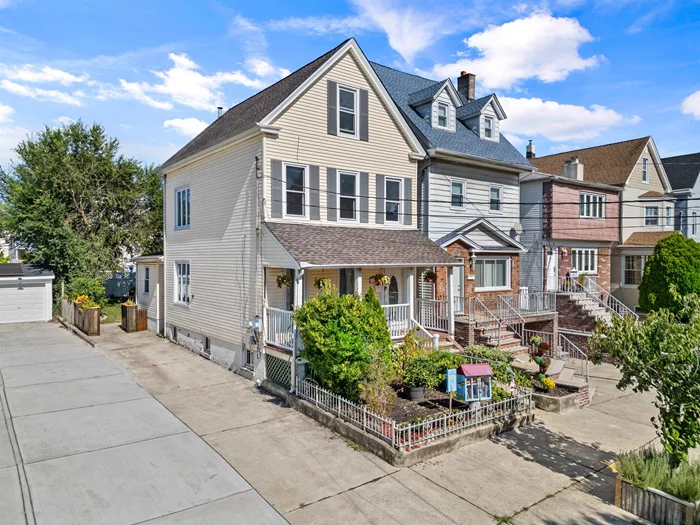 Beautiful two-family home on an extra-large lot (30x100), offering an exceptional blend of indoor and outdoor living. This property features a gorgeous yard oasis, perfect for relaxation and entertaining, along with parking for three carsa rare convenience in Bayonne, NJ. Inside, you'll find hardwood floors that add warmth and elegance to every room and large windows that fill the space with natural sunlight. The home is equipped with central air and smart temperature control systems, ensuring comfort and ease of management. Located in the Horace Mann School District, and just one block from the Hudson-Bergen Light Rail, commuting to NYC is a breeze. You'll also be steps from local shops, restaurants, and cafs on Broadway, with Costco, Lidl, and other shopping centers just minutes away. This versatile property combines modern amenities, outdoor tranquility, and unbeatable convenience rent one unit and live in the other. Schedule a showing today!