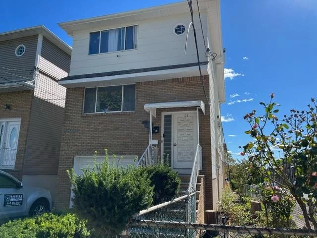 Popular multi-family house type in Harrison on an one-way street cross a playground. Close to Rutgers and NJIT Universities with many unique features: Legal 2-fimily with total 4-floors, 5 rentable units, workshop/storage basement, studio with wet bar and fireplace. Corner home on high ground with easy access from front and back. Finished backyard with patio, roof, fence and gate. 4-onsite parking spaces and more easy parking off street. Few minutes walk to Path Station or 26 Minutes train ride to Manhattan. Newly updated with new roof, staircase, kitchen, appliances, electric panels and more. Total five rentable units include one 3-bedroom apt, one 2-bedroom apt, 1 studio, 1-basement security vault storage and one covered backyard parking space. 3-units are rented out and delivered as occupied. Parking and storage spaces are open to rent out. Only show to pre-qualified buyers with proof of funding after Oct-20.