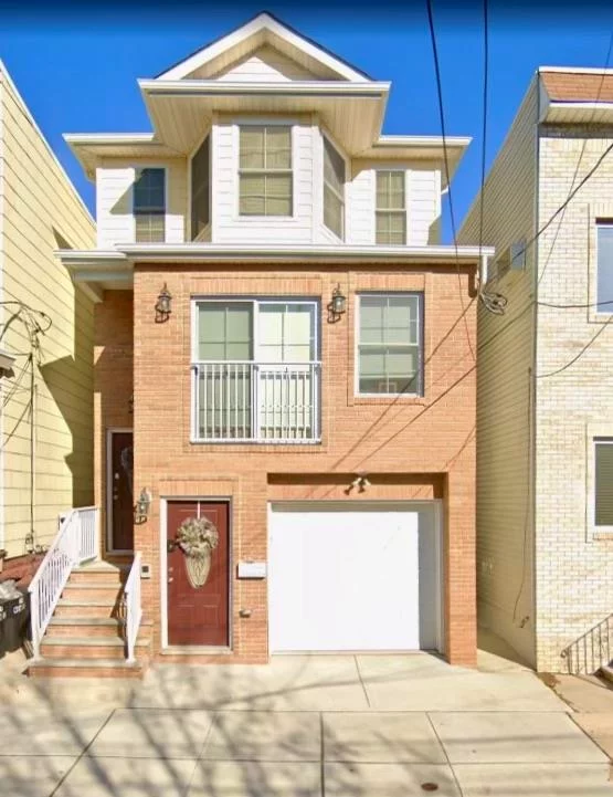 Brighten your everyday with this 2-family home built in 2021, in a quiet residential area in Bayonne! This newly built home features two units each with its own unique design and luxurious amenities. Unit 1 is spacious Three-story TRIPLEX, 3-bed, and 2.5-bath with master bedroom with a touch of elegance.  Unit 2 is Two-story DUPLEX design, 3-bed, and 2-bath with master bedroom. Both units have a modern white kitchens with white quartz countertops and stainless-steel appliances, hardwood floors throughout, air conditioning for year-round comfort, each unit have Washer and Dryer, separate utilities. Fenced in yard with spacious accommodations. Garage parking for 3+ cars. Both units are thoughtfully designed with modern finishes and offer a comfortable and contemporary lifestyle. A few blocks from the 22nd Street Light rail. Lincoln School district. Near Parks, Shopping, Gyms, etc...  Don't miss out on this fantastic opportunity to own a stunning home. Contact now for more information and to schedule a viewing.