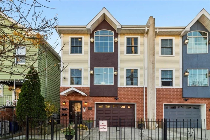 Welcome to 103 Jefferson Ave! This unique 2-Family home was built in 2009 on the majority of the 25ft wide lot, providing you an exceptional interior living space spanning 3520 sqft. Walk through the front entrance and be amazed by the exotic asian mahogany flooring featured in both apartments! To the right, enter the spacious garage with enough parking for up to 3 cars+ including the driveway. A separate entrance leads to the ground floor area of the duplex. This huge space features a gorgeous wet bar, half bathroom, kitchenette area, large windows, and a private yard with fig trees and a shed for storage. One of the closets includes a centralized multimedia system for ethernet/wifi, which connects to almost every room for hardwired ethernet! The house also has centralized speakers and is cctv ready. Up the stairs, you will find a kitchen with beautiful granite countertops and backsplash, frigidaire appliances and range. With 3 bedrooms, 2 full baths, and a separate living + dining room on this floor, there is a ton of space for you and your family! In unit 2, you will find a spacious layout with 3 beds, 2 baths, and a living/dining room. The soaring high vaulted ceilings, skylights, and very large windows sundrench the exotic hardwood, allowing it to truly shine! This unit has access to the attic for bonus storage. Additional features include washer/dryer, central AC, video intercom system, and electric garage opener. This location is unbeatable, an easy commute to JSQ Path or to Hoboken. Right next to highly rated Patricia M. Noonan Elementary School PS #26 and Jotham W. Wakeman School, PS #6. Amazing neighborhood down the block from newly reopened JC Reservoir park + Pershing Field Park, shops on Central Ave + Palisade Ave. This home is a must see and ready for you to move in!