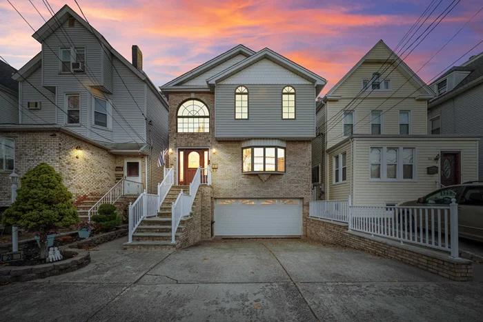 Warning- your jaw is going to drop! Prepare to fall in love with this stunning, custom built meticulously maintained two family property in midtown Bayonne. Nestled on an oversized lot, you have a total of six bedrooms and three and a half baths spread amongst this expansive layout. Upstairs emits a single family feel equipped with gorgeous hardwood floors, recessed lighting and a masterful flow loaded with a plethora of upgrades including surround sound and a central vacuum system. Generously sized bedrooms including a primary ensuite with accompanying jacuzzi tub ensures the tranquility you are searching for. Enjoy your meals in the timeless kitchen with double electric oven, five burner gas cooktop and a built-in refrigerator all within abundant cabinetry and dining space. Anderson french doors lead you to a private Trex deck and a low maintenance outdoor oasis with pavers, perfect for all of your favorite activities. Perfection is an understatement. Be the one to call this yours today!