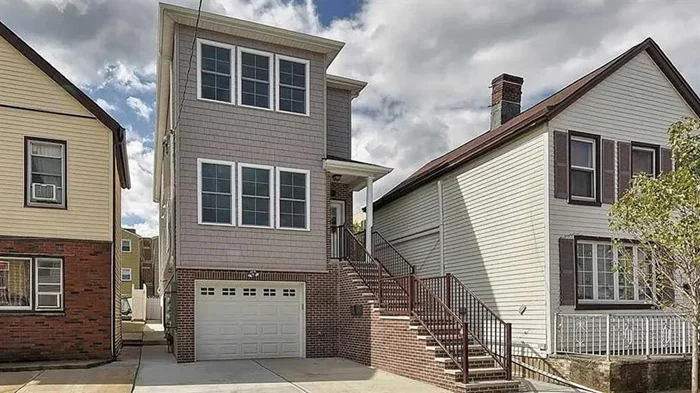 Built in 2019, this modern 2-family home in downtown Bayonne is on a 25x100 lot. Prime location: close to Route 440, 7 mins to Costco, and a short distance to the 8th St Hudson Bergen Light Rail. Currently vacant with private entrances for each unit. Features include 3 parking spots (1 garage, 2 driveway) and a spacious backyard with a shade tree. The owner's duplex (1st floor + basement) includes 3 bedrooms, 3 full baths, an open layout, in-unit laundry, and interior stairs. The 2nd-floor unit has an open floor plan, in-unit washer/dryer, and rental potential. Central air cooling/heating throughout. Perfect for investment or owner occupancy with rental income.