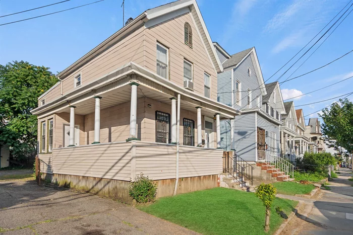 Be A Part Of Jersey City Now, 2 FAMILY, Bright And Airy. Separate Entrances For Utmost Privacy. Sep Utilities. 37 WIDE LOT with Driveway PARKING FOR 4+ CARS. Close To All, Columbia Park, Kennedy Blvd Transportation, And Blocks To The Light Rail! Low Taxes! Great For Smart Homebuyer or Savy Investor!