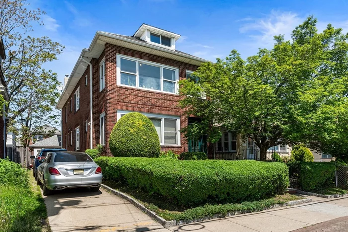 Start the New Year in this Large and Beautfiul (3024 sq.ft.) Income Producing Brick 2 Family home on a (40x100 Lot) with plenty of parking. (4 car tandem driveway parking + 1 car garage). This home has beautiful craftsmanship in both apartments. Roof and hot water heater replaced in 2023. You will love the old world charm in this beautiful 2 family home. Features include stained glass windows, the beautfiul wood work, built-ins, curved crown moldings, french doors, wood floors, high windows, high ceilings and lots of original lighting to the house. The 1st floor has an eat-in kitchen, SS Stove, a built-in hutch for your china and an exit to backyard, great for barbecuing, 2 bedrooms, a full bath, a large formal dining room, a large living room and a sunroom all with high ceilings. The 2nd floor has a large living room, dining room, sunroom, eat-in kitchen with built-in hutch, SS appliances and granite counters, 2 spacious bedrooms, a full bath plus a bonus room/home office/guest room with closet, lock and key at the top of the stairs just outside the 2nd floor apt. A high and dry attic and high and dry basement with bar and separate entrance/exit await your finishing touches. 2 washers and 1 dryer in basement. Must see to appreciate all the details of this beautiful income producing home with plenty of parking. Transportation to NYC at corner on Kennedy Blvd. Shopping and great restaurants nearby. Deli/Coffee Shop across the street. 5 blocks to 167 acre James Braddock Park with Lake, Free Tennis/Pickleball and many other sporting activites for residents of North Bergen. A great house in a great community. Come and take a tour before it's gone.