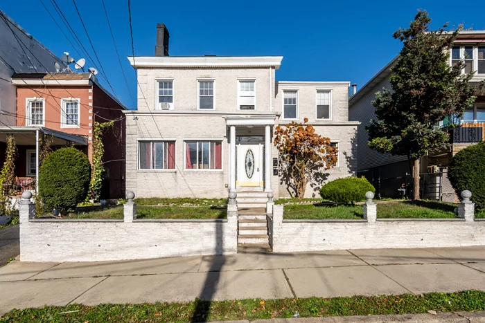 Two family home on an oversized 50' x 120' lot. Current rent roll is $5250 per month. Located on a quiet dead end street. The Journal Square Path Station and bus transportation are four blocks away. Ideal lot size for a large multi unit home or splitting the lot to build two multi family homes