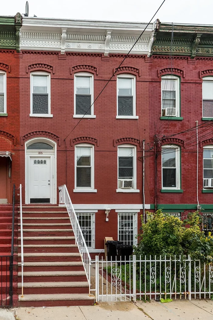 Welcome to this renovated two-family residence located in the Bergen-Lafayette neighborhood of Jersey City. Unit 1, is a four bedroom duplex. It features three bathrooms, spacious dining/ living room, and a kitchen . Unit 2 features one bedroom, one bathroom, den area, dining and living room, and a kitchen. Unit 1 is currently generating rental income, while Unit 2 is vacant, both are ready for its new owner/investor. Conveniently located near Berry Lane Park, Garfield Avenue Light Rail Station, and Liberty State Park Light Rail Station and several major bus routes.