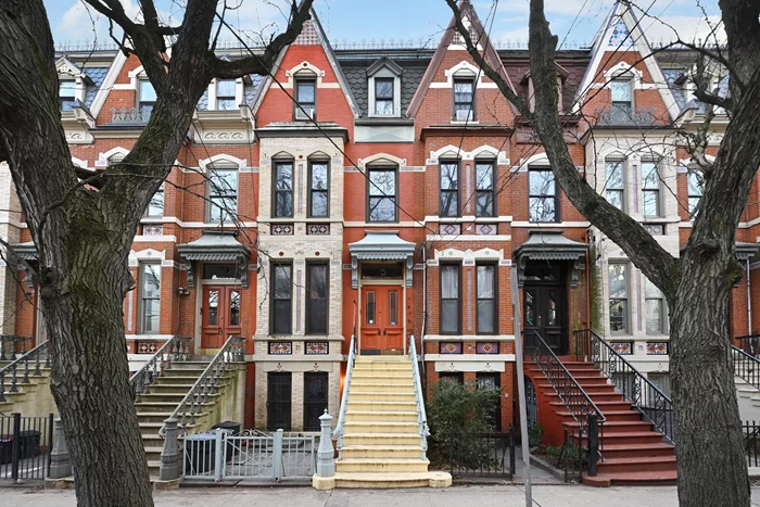 3 Hampton Court, A Downtown Jersey City Gem with Income Potential! This beautifully maintained two-family brownstone in the desirable downtown Jersey City's Van Vorst Park neighborhood offers a rare blend of classic charm and modern living, presenting an exceptional opportunity for homeowners and investors alike. Located at 3 Hampton Court, this property boasts original details, spacious layouts, and a prime location, making it a true standout. The stunning primary residence encompasses three bedrooms and two bathrooms. Step inside and be captivated by the preserved original mantles, gleaming hardwood floors, and oversized windows that flood the rooms with natural light. High ceilings amplify the sense of spaciousness, creating an airy and welcoming atmosphere. Three generously sized bedrooms provide ample space, while a dedicated laundry room adds modern convenience. The ground-floor apartment is equally impressive, featuring hardwood floors throughout, a spacious bedroom, and desirable outdoor space perfect for relaxing or entertaining. The kitchen is a chef's delight, showcasing stylish shaker cabinets accented with unique textured glass, and complemented by exposed brick that adds a touch of industrial chic. This versatile space offers excellent potential for rental income or multi-generational living. Beyond the individual residences, 3 Hampton Court's location is unbeatable. Nestled in the heart of downtown Jersey City, you'll enjoy easy access to transportation, including PATH trains to NYC, as well as a vibrant array of restaurants, shops, parks, and nightlife. Don't miss this chance to own a piece of Jersey City's history while enjoying modern comforts and income potential. Schedule your showing today and experience the unique appeal of 3 Hampton Court!