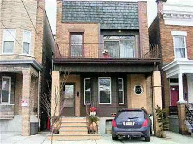 PRIDE OF OWNERSHIP. SUPER CLEAN HOME. BRICK EXTERIOR AND MANY UPGRADES INSIDE BALCONY W NY SKYLINE VIEWS. DECK IN REAR W SUN ROOM. FIN BASEMENT W BAR, SUMMER KIT, 2 ROOMS AND LAUNDRY, HARDWOOD FLOOR THROUGH OUT AND FIRE PLACE IN 1ST FLOOR. PRIVATE BACK YARD WITH DECK FOR ENTERTAINING.