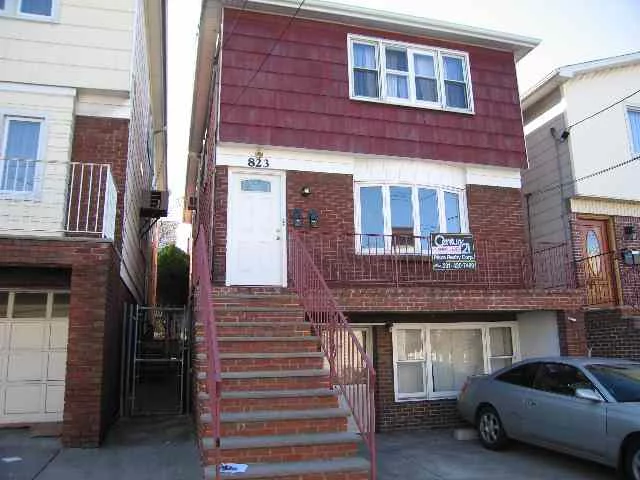 BEAUTIFUL WELL KEPT TWO FAMILY WITH FULL FINISHED BASEMENT. EACH APT HAS HARDWOOD FLOORS, EIK, LARGE LR AND DINING AREA. KITCHENS ARE COMPLETE WITH NEW CABINETS AND APPLIANCES. DRIVEWAY PARKING FOR TWO CARS.