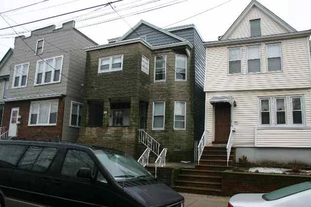 IMMACULATE TWO FAMILY, OPEN FLOOR PLAN, GLEAMING HARDWOOD FLOORS, HIGH CEILINGS, BRIGHT SUNNY KITCHENS, CERAMIC TILE BATHS, GARAGE PARKING, LARGE BACKYARD, SHORT DISTANCE TO PARK AND TURNPIKE. NYC BUS ON CORNER. WALKING DISTANCE TO LITE RAIL. ELECTRIC RECENTLY UPDATED.