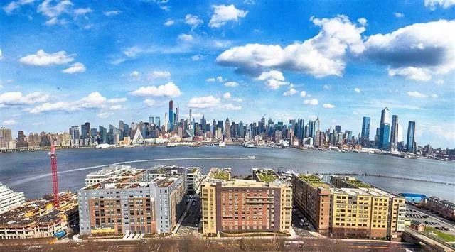 STUNNING 2BR/2BA UNIT WITH SPECTACULAR NEW YORK CITY PANORAMIC VIEWS, APPROXIMATELY 12OO SQ FT, THIS UNIT FEATURES CENTRAL A/C, GREAT OPEN LAYOUT, GRANITE COUNTERTOPS, SS APPLIANCES, MOSAIC MARBLE TILE AND HARDWOOD FLOORS THROUGHOUT. PRIME LOCATION IN DESIRABLE PRE-WAR BUILDING ON BLVD EAST. BUILDING HAS ELEVATOR, LIVE IN SUPER, LAUNDRY FACILITIES, BIKE ROOM AND ASSIGNED STORAGE. NYC BUSES AT YOUR DOOR STEP AND NEAR NY WATER FERRY and LIGHT RAIL STATION AT PORT IMPERIAL. SUBJECT TO COOP APPROVAL.