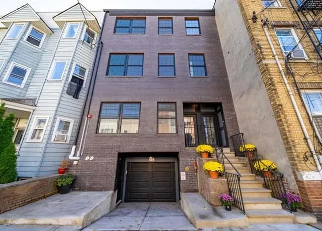 Welcome to this bright, spacious 1st level apartment in the newly renovated side by side multi-family home in red hot Jersey City Heights! This two floor, 3 BR 3 BA apartment features an amazing open concept layout with European wood plank flooring, quartz countertops with kitchen island seating, stainless steel appliances, nest thermostats and washer/dryer! The 1st floor features 2 BR's. One is an ensuite with its own private bath with double sinks, stand up shower and smart mirror. The main hallway bath is pristine featuring double sinks and shower/tub combo. The 2nd floor master BR features a modern style layout with desk nook for your work space needs, a stylish master bath with double sinks, stand up shower, smart mirror and plenty of storage space. Don't forget the beautiful, backyard escape for all of your relaxing or entertainment needs! 1 Garage parking space is negotiable. This is a can't miss location within walking distance to the path, parks, restaurants and easy access to downtown Jersey City! Don't miss it!