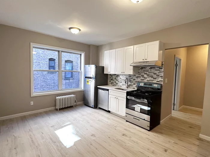 This recently updated 2 bedroom unit is conveniently located a short distance from the Journal Square PATH station, it's perfect for commuters. The home features hardwood floors, a new gas stove, refrigerator, microwave and dishwasher. Rent covers heat, cold/hot water, and the building offers a shared laundry room. Tenant pay half broker fee.
