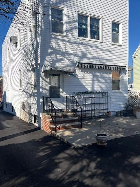 The location of this charming 1st floor apartment puts you right at the edge of beautiful Bergen Point Bayonne...this gives you quick access to major transportation options, shopping, and well-loved dining spots! In addition, the traditional style layout of this unit offers you a very large eat-in kitchen, spacious formal living and dining rooms, and a roomy front entry hall. There are a few bonus features too - a large built-in Butler's pantry cabinet, an extra walk-in closet, and OH, YES! Garage parking for 1 car is INCLUDED!