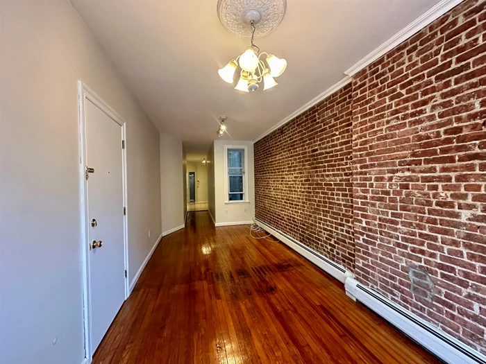 Superb Renovated 1 Bed 1 Bath, Exposed Brick Living Room, Hardwood Flooring, Tile Kitchen w/ Gas Range, Dishwasher, Track Lightings, Good Sized Bedroom, Laundry in Basement, Bike Storage Avail, Walk to LightRail Station, Busline Around the Corner to NYC and JC Downtown and Hoboken , Hot and Cold Water Included, Maximum 2 Occupant, No Pets, Price to Rent, ... Avail for Immediate Occupancy.