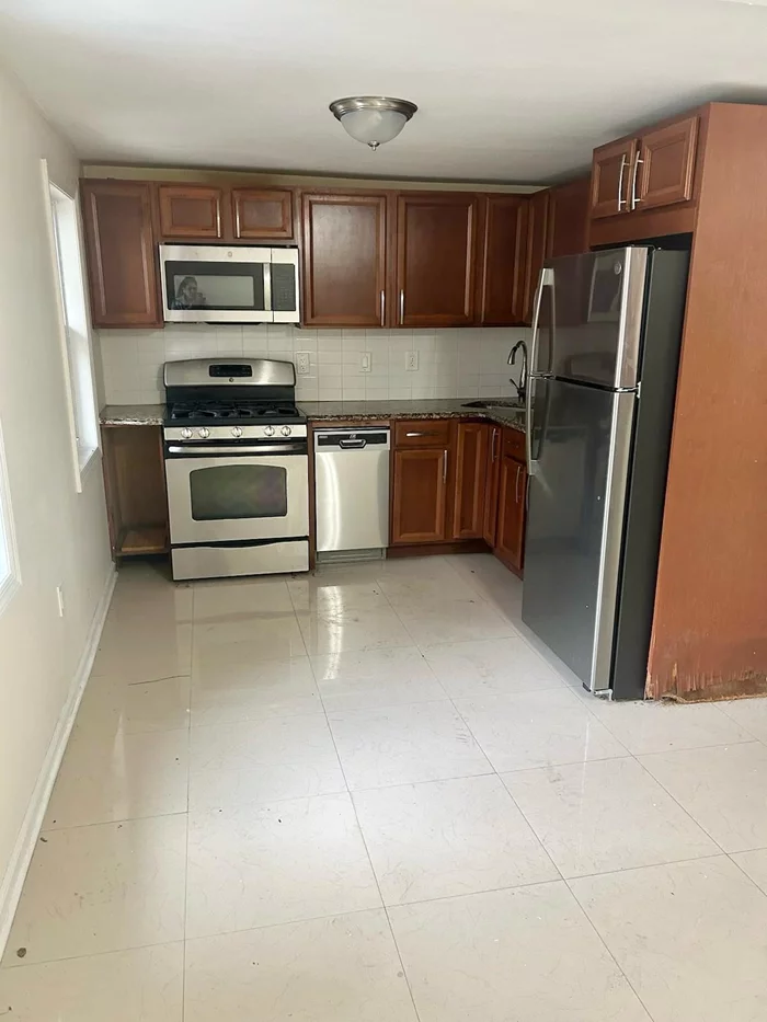 Welcome to your new home at 30 Cambridge Ave in Jersey City! This charming 1-bedroom, 1-bathroom rental is the perfect blend of comfort and convenience. This home includes updated kitchens, high ceilings, tied floors and laundry and is 1/2 block to public transport, parks, and restaurants. Small pets allowed