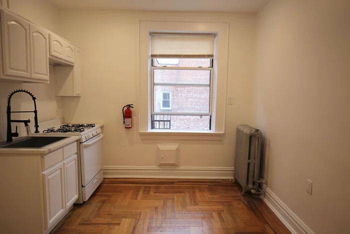 Junior 1 Bedroom with heat and hot water included located right in front of park. Building has elevator and laundry room. Apartment has been completely renovated. Major transportation to NYC and Hoboken located right in front of building.