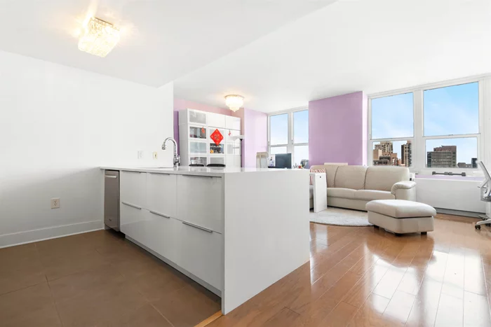 Gorgeous NYC Views, Open Layout, Oversized Windows and High Ceilings welcome you into this one bedroom home. Kitchen features modern white high gloss cabinets with abundant storage space, quartz counters with waterfall countertop. Marble bathroom with shower system, body jets and multi spray faucet. Large, custom walk in closet in bedroom. Hardwood floors throughout, full size washer/dryer in unit. Premium, full service building amenities include: Full time concierge and doorman, seasonal outdoor pool, BBQs, fire pits, gym, indoor grotto with sauna and steam room, virtual golf room, resident's lounge, media room, table tennis, indoor and outdoor children's play area. Parking available for a fee. Convenient to all NYC transportation, restaurants, shops and parks. No Pets. Available JULY 1st.