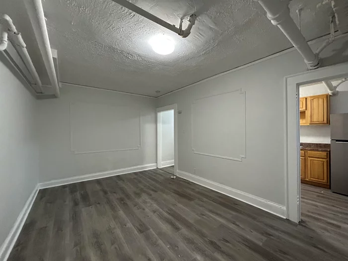 Welcome to this newly renovated ground level one bedroom. This spacious unit offers big windows and plenty of light. Updated kitchen and bathroom. Private entrance. Great location close to all NYC transportation, Seton Hall University and only 15 minutes from downtown Montclair.