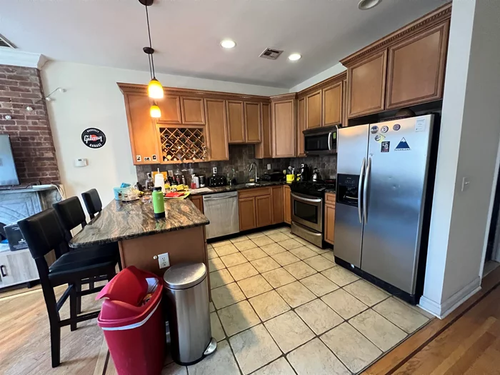 Spacious updated 3 BR/ 2 BA in prime Hoboken location. The home features an open concept with plenty of natural light, hardwood floors, central air, granite counter and stainless steel kitchen and in unit washer / dryer. Amazing Washington Street location. Close to shops, dining, PATH train and easy transportation to New York City. Available 6/1. Don't miss this one!