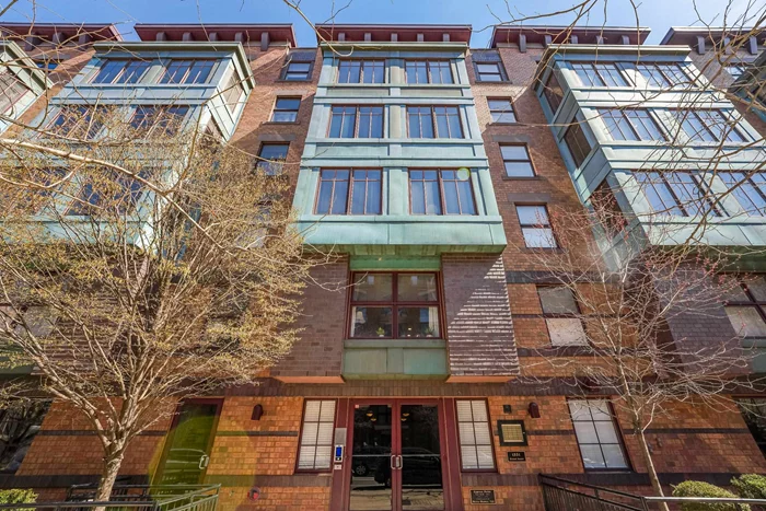 This sun-lit corner 2 bedroom/2 bath condo in Uptown Hoboken features gleaming hardwood floors, central AC, ceiling fans, windows throughout, decorative fireplace, and a washer/dryer in unit. Open kitchen flows perfectly into the large living and dining room. Both bathrooms have been extensively renovated with top-of-the-line finishes. Deeded parking space for one car and extra storage. Steel and Brick construction. Elevator building with exercise room and common courtyard for relaxing. Close to public transportation, parks, schools & restaurants.